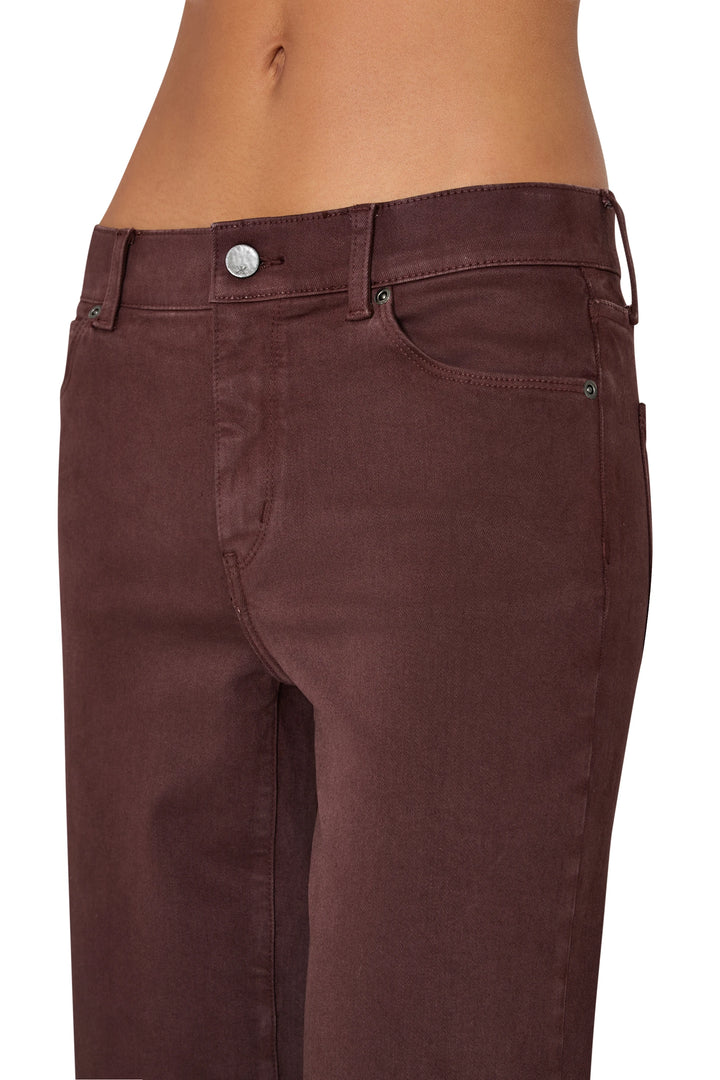 Coated jean with cropped, straight-leg silhouette and defined waistband construction, detail view.