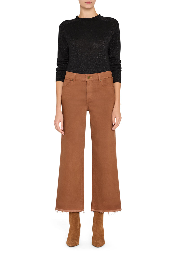 Cropped coated jean with frayed hem, straight silhouette, classic five-pocket construction, front view on model.