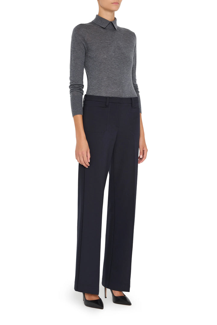 Wide-leg, double knit pant with sleek silhouette and tailored seams. Front view on white.