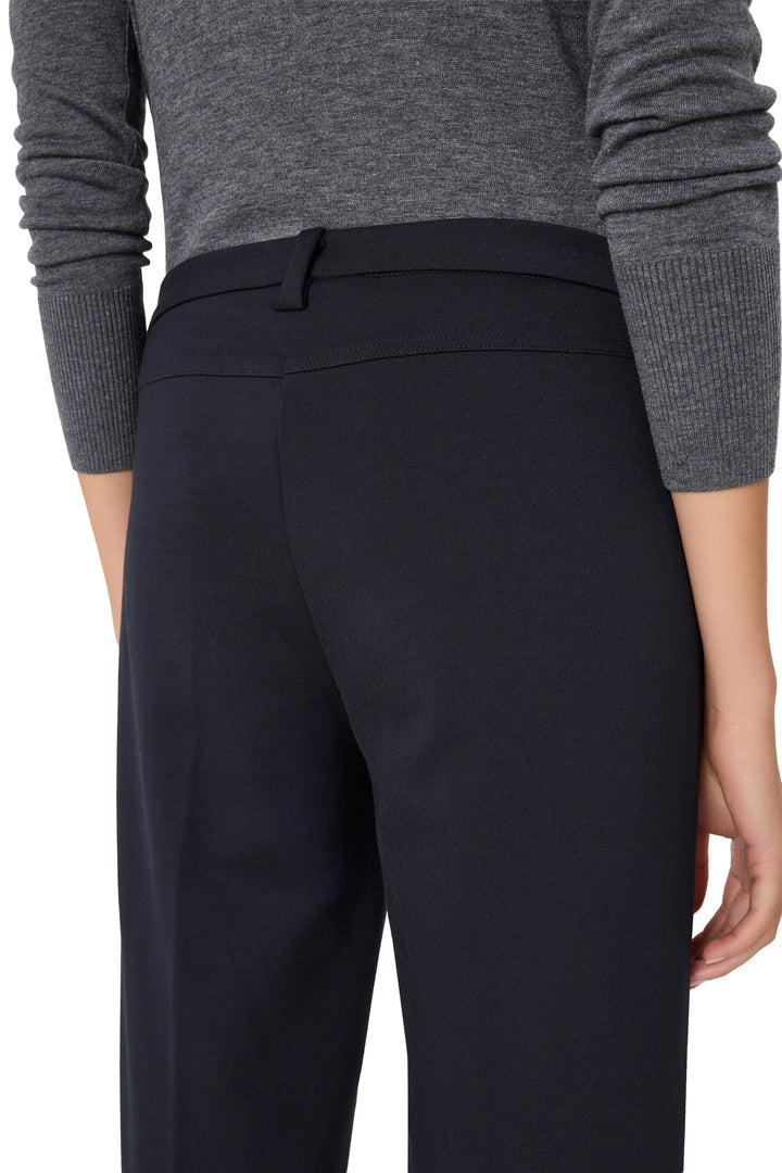 Wide-leg, double knit pant with tailored waistband and clean lines; back view on model.