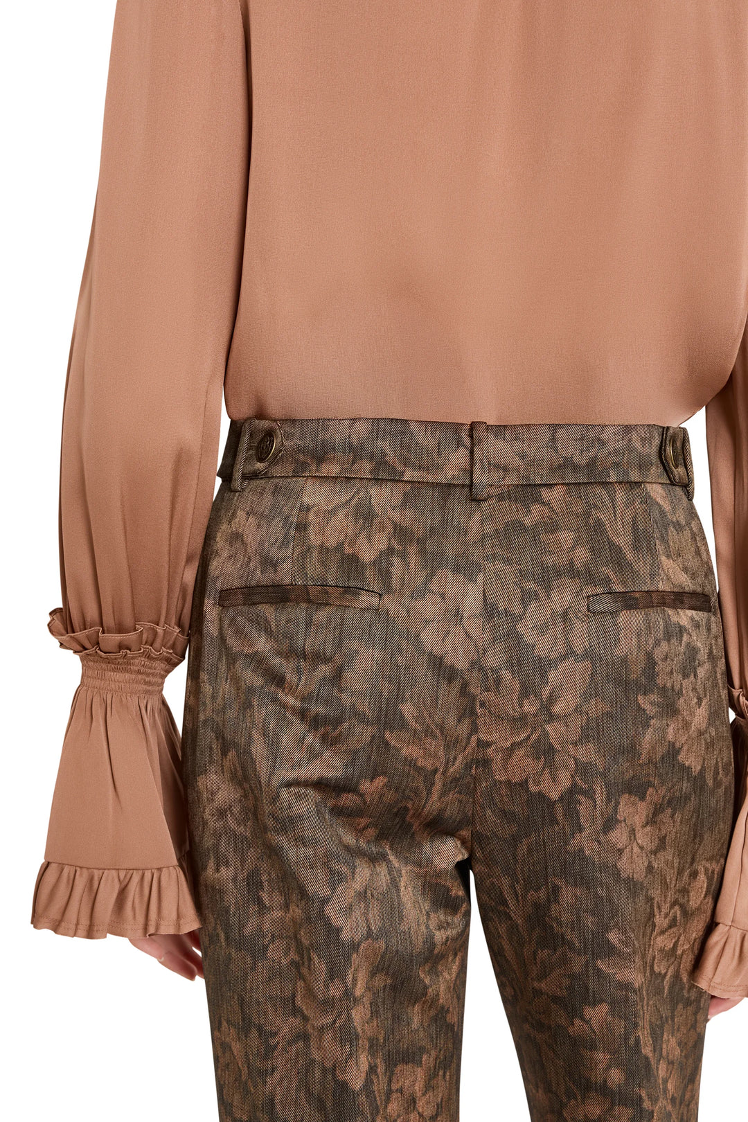 Back view of Melanie Jacquard Pant in floral jacquard featuring rear welt pockets on model.