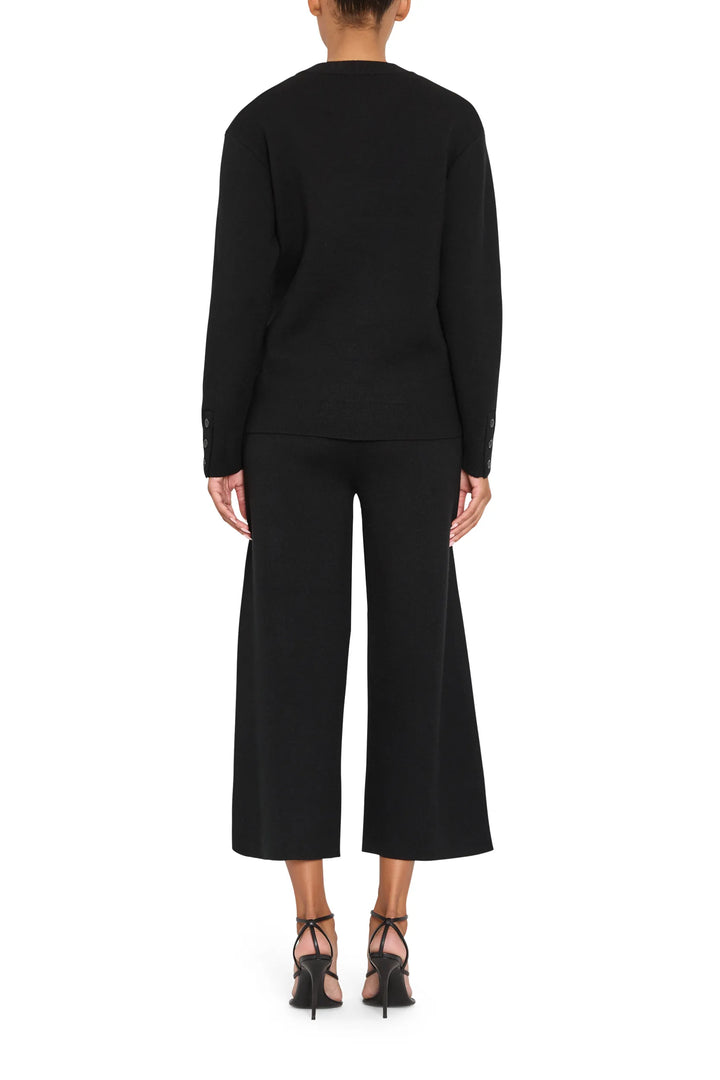 Relaxed, draped Marlowe Knit Cardigan with classic fit and fine knit texture, back view on model.