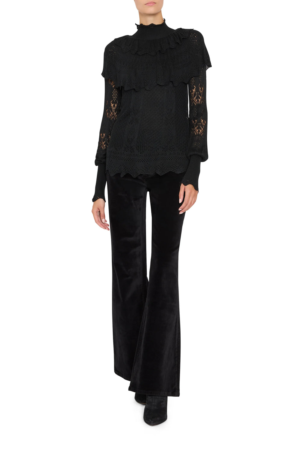 Justina Ruffle Sweater in black with a high neck, Victorian-style yoke, and lace-inspired sleeves, front view on model.