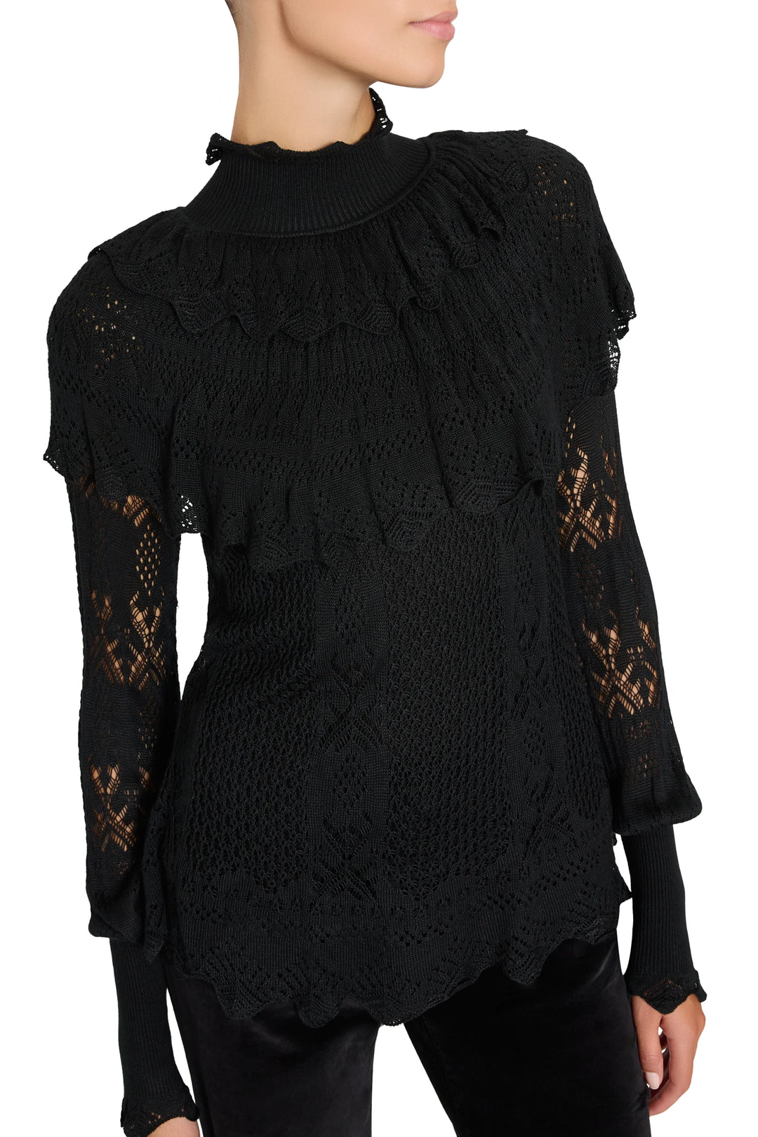 Black Justina Ruffle Sweater with a ruffled mock neck and Victorian-style open-knit sleeves, model editorial view.