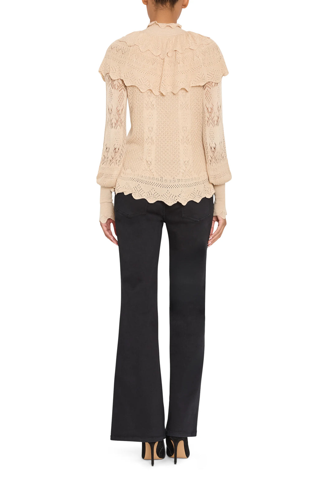 Justina Ruffle Sweater with a ruffled collar and lace-inspired pointelle sleeves, back view.