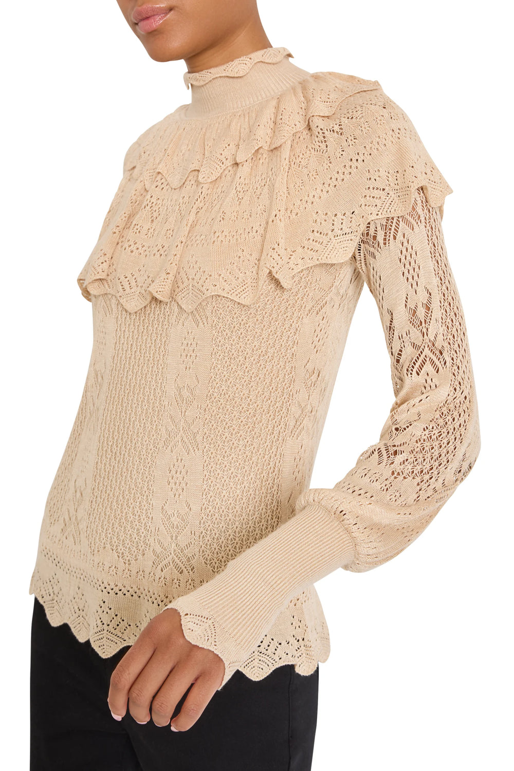 Justina Ruffle Sweater with mock neck, Victorian-style openwork, ruffled yoke, and ribbed cuffs, front view on model.