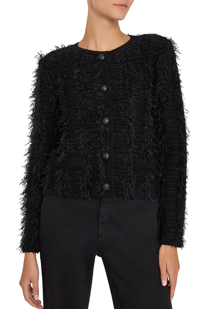 Longline open-front cardigan with fringe trim, soft knit fabric, and relaxed fit. Front view on white.