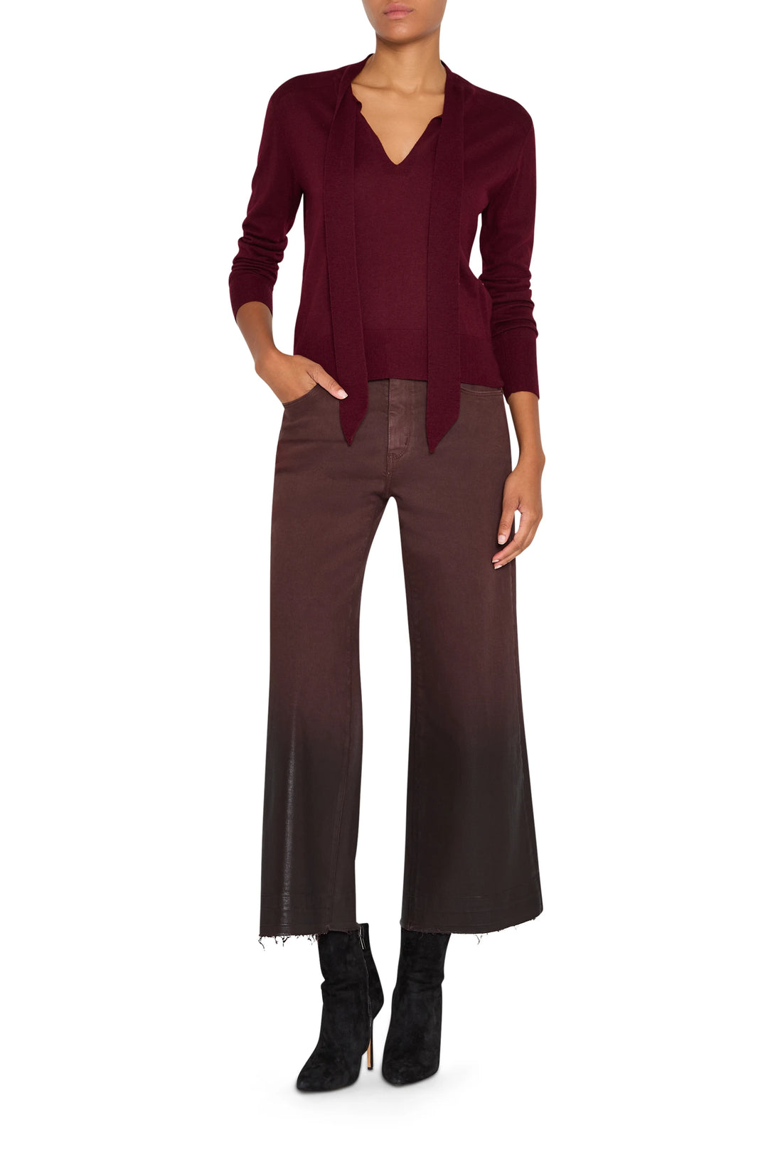 Relaxed-fit sweater with tie neckline, soft knit fabric, long sleeves. Front view on model.
