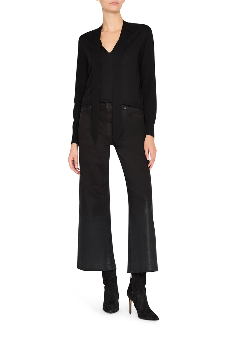 Black knit Felicity Sweater with tie neckline, relaxed fit, ribbed hems; front view on model.