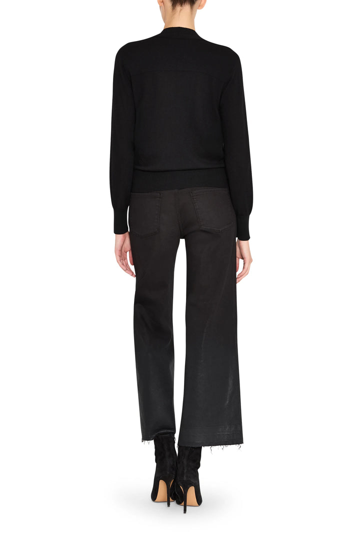 Relaxed, wide-leg silhouette, mid-rise fit, classic 5-pocket construction. Back view on model.
