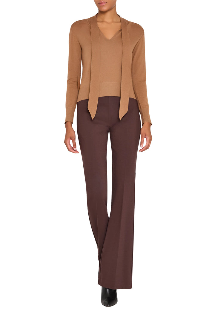 Relaxed fit sweater with ribbed cuffs and hem in soft knit fabric, front view on white.