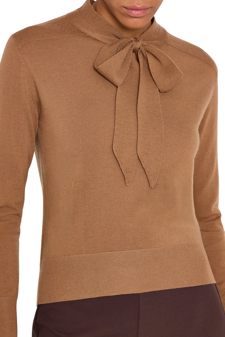 Relaxed-fit Felicity Sweater with tie neckline and ribbed cuffs in knit fabric, front view on model.