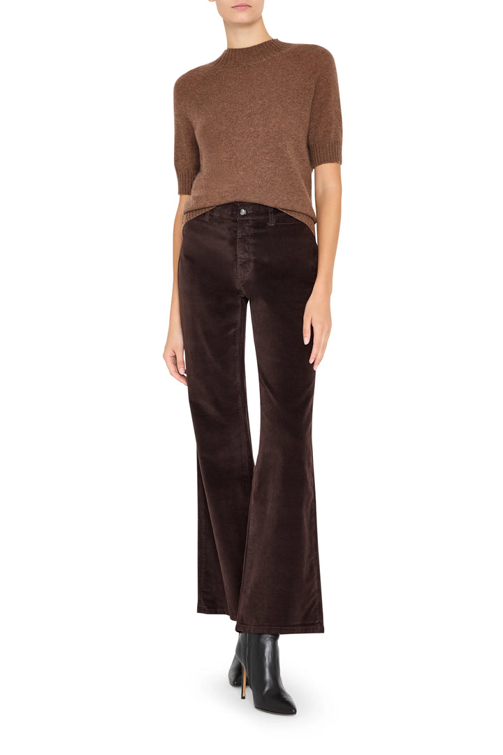 Slim silhouette, long-sleeve cashmere crew neck sweater with classic rib trim; front view on model.