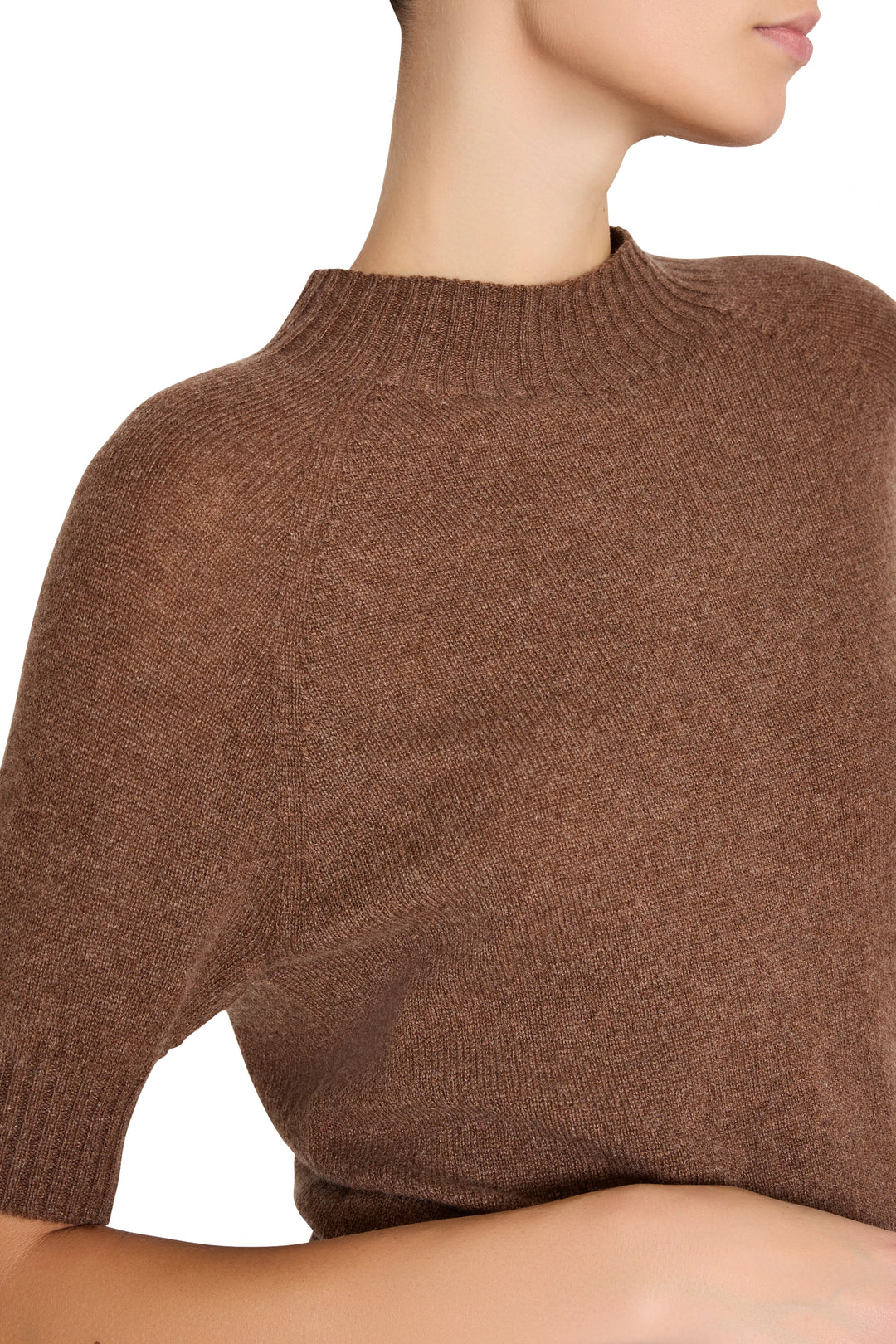 Cashmere crew neck sweater with classic silhouette and fine knit texture, front view on model.