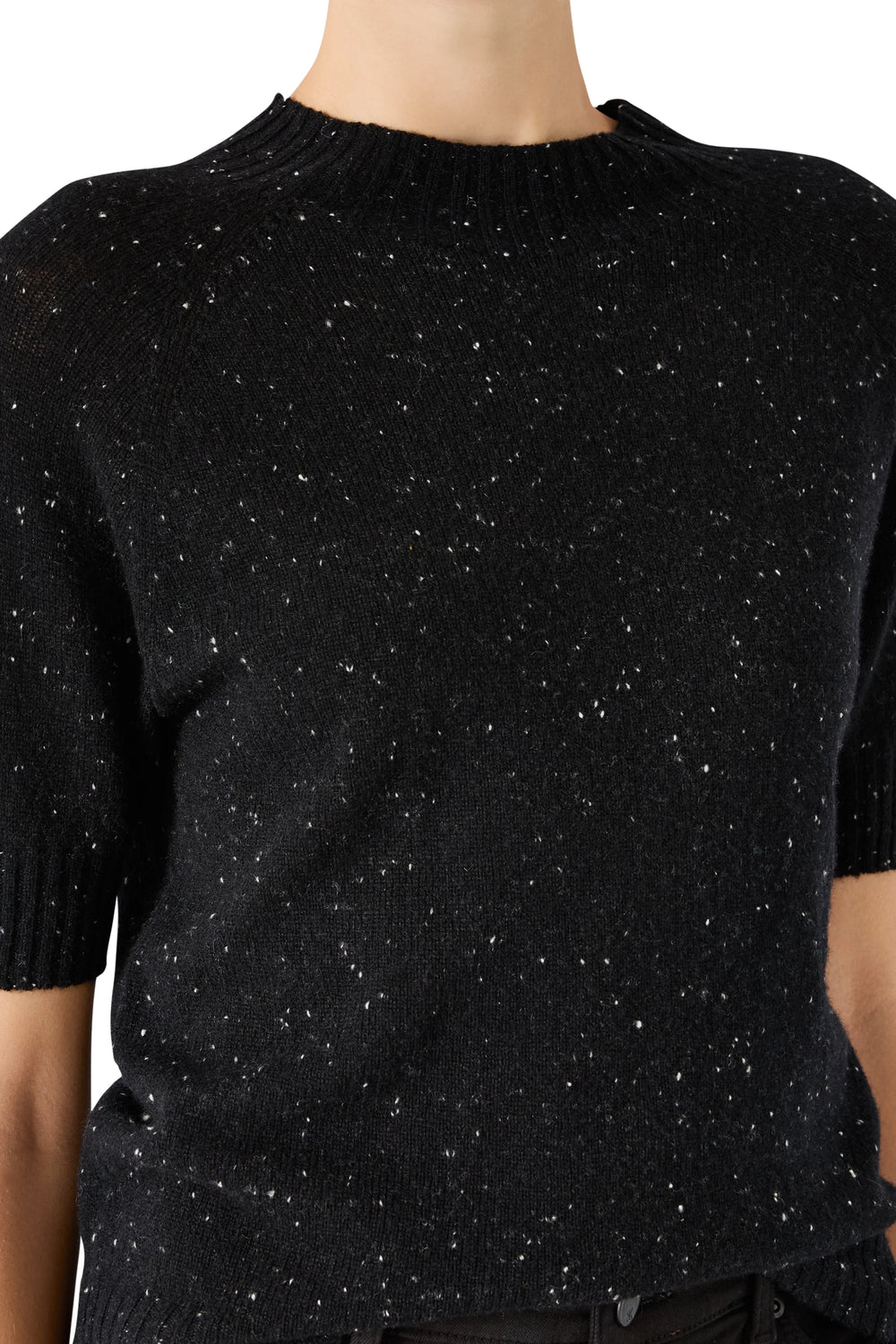 Crew neck cashmere sweater with ribbed collar and cuffs, speckled knit. Front view on model.