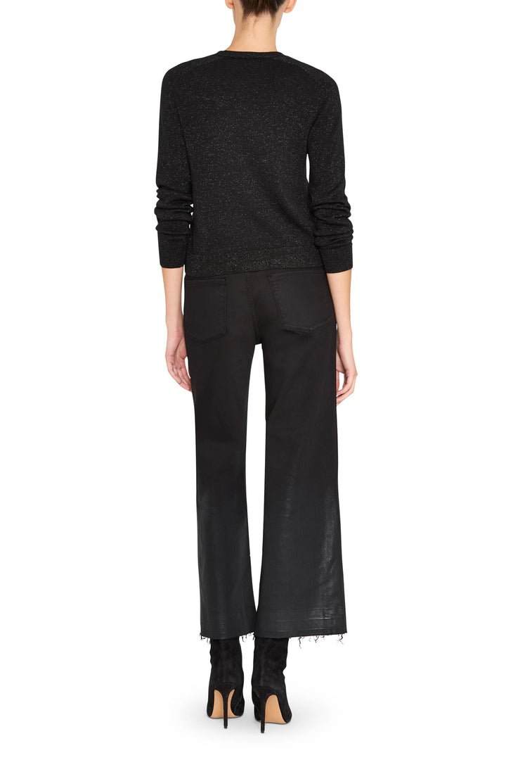 Relaxed silhouette black Khloe Sweater Cardigan with open front and ribbed cuffs, back view on model.