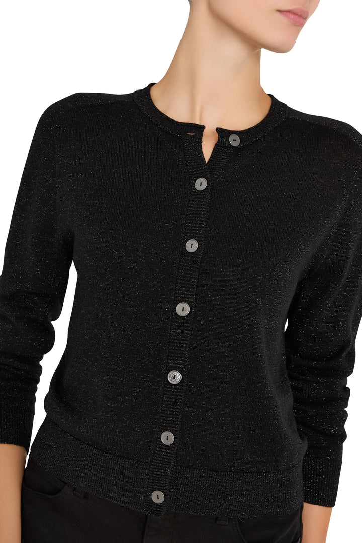 Cropped fine-gauge knit cardigan with long sleeves and round neck, fitted silhouette; front view on model.