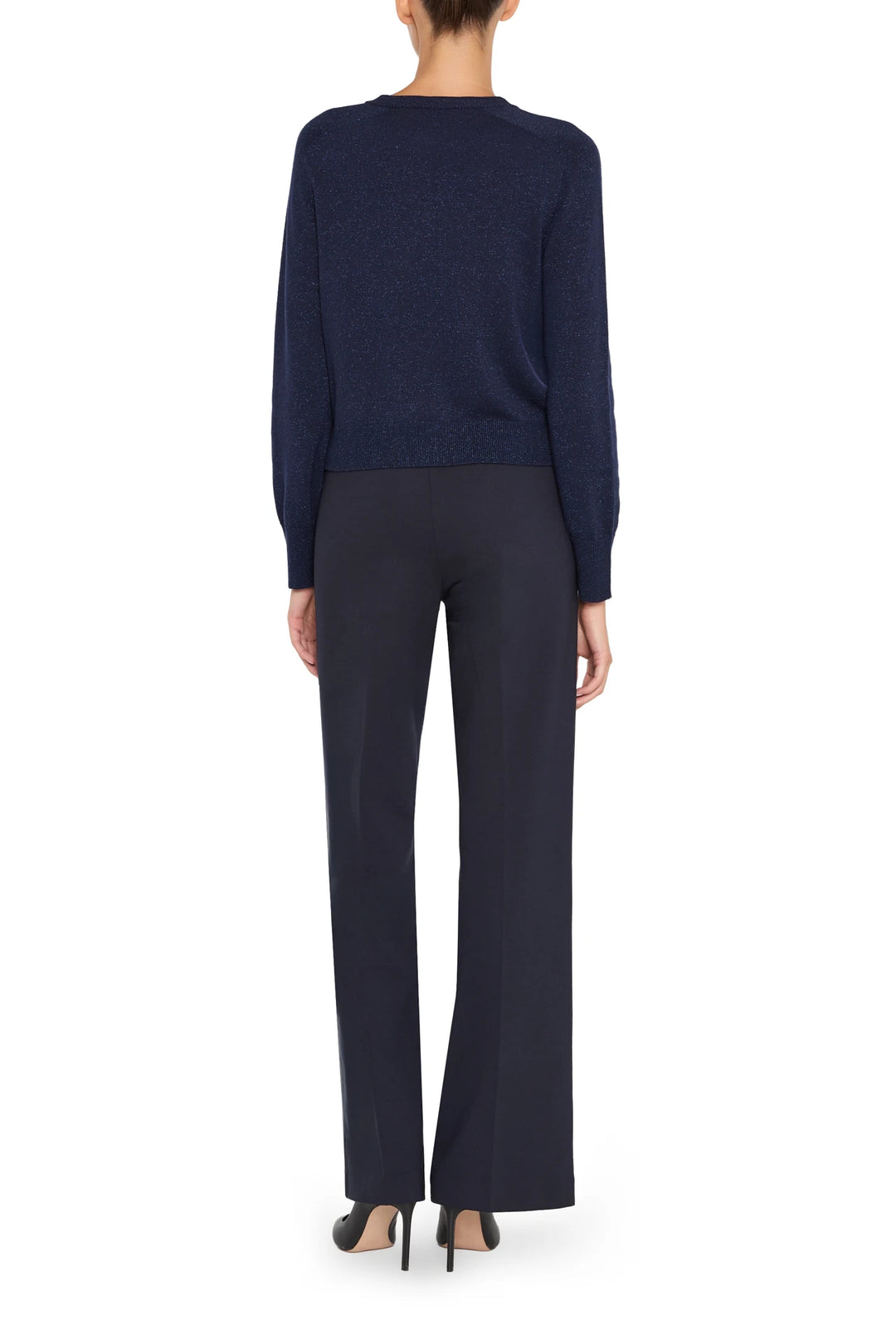 Relaxed-fit dark blue cardigan with open front, long sleeves, and ribbed hem; back view on white.
