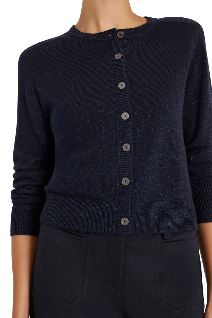 Fine-gauge knit cardigan with open front and relaxed fit, long sleeves; front view on model.