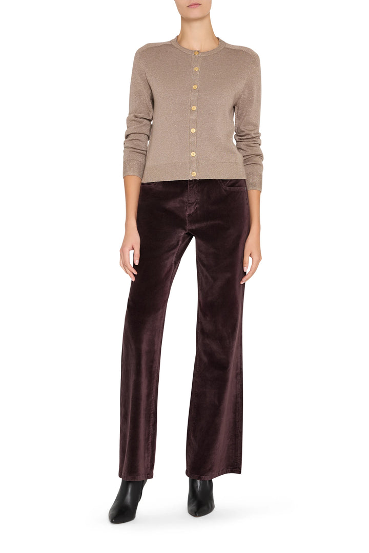 Cardigan with relaxed silhouette, decorative metal buttons, ribbed cuffs and hem; front view on model.