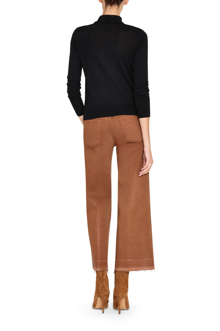 Relaxed fit sweater with ribbed cuffs and hem, crew neck, soft knit fabric; back view on model.