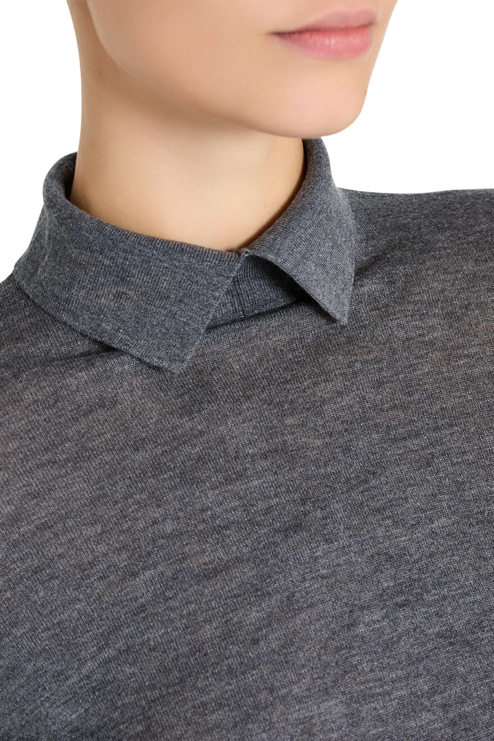 Collared fine-gauge knit top with clean neckline and straight silhouette, front view on model.