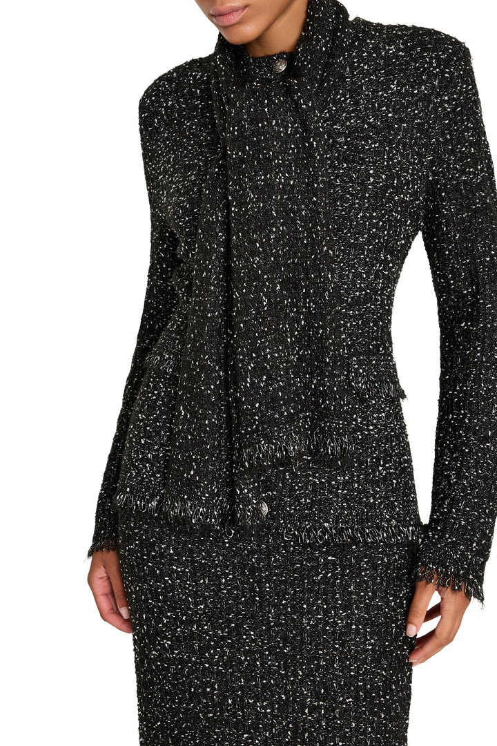 Relaxed-fit cardigan with textured tweed knit, button front, ribbed cuffs and hem; front view on model.