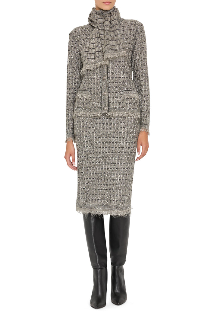 Straight-cut tweed sweater cardigan with button front and ribbed trim, hip length; front view on model.