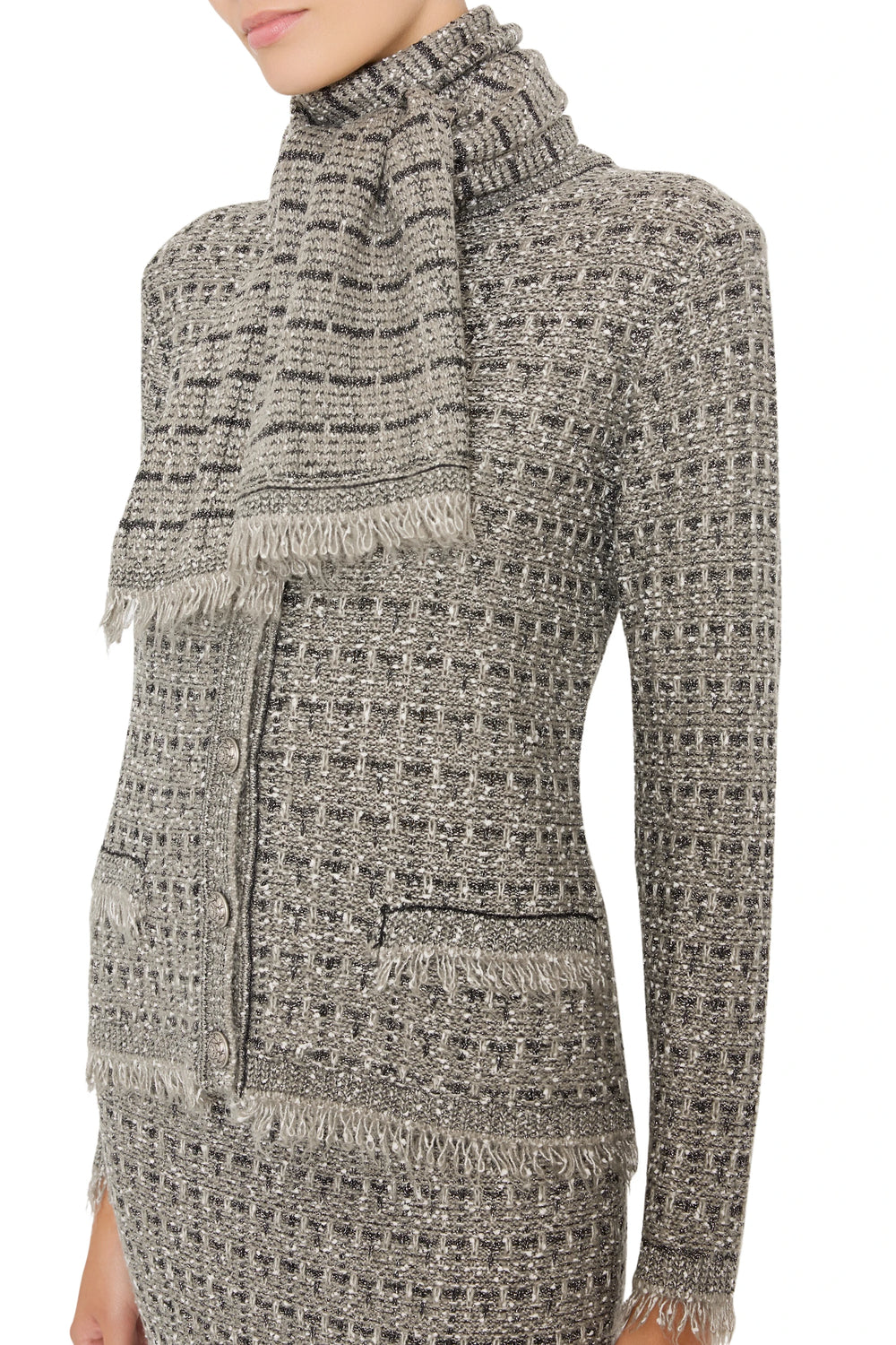 Relaxed-fit cardigan with button front, ribbed cuffs and hem, soft tweed knit; front view on model.