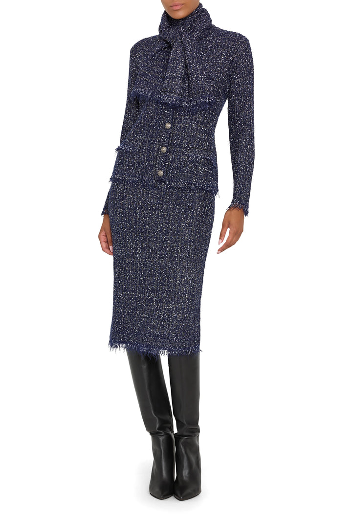 Tweed sweater cardigan with relaxed silhouette, ribbed trims, button front. Front view on model.