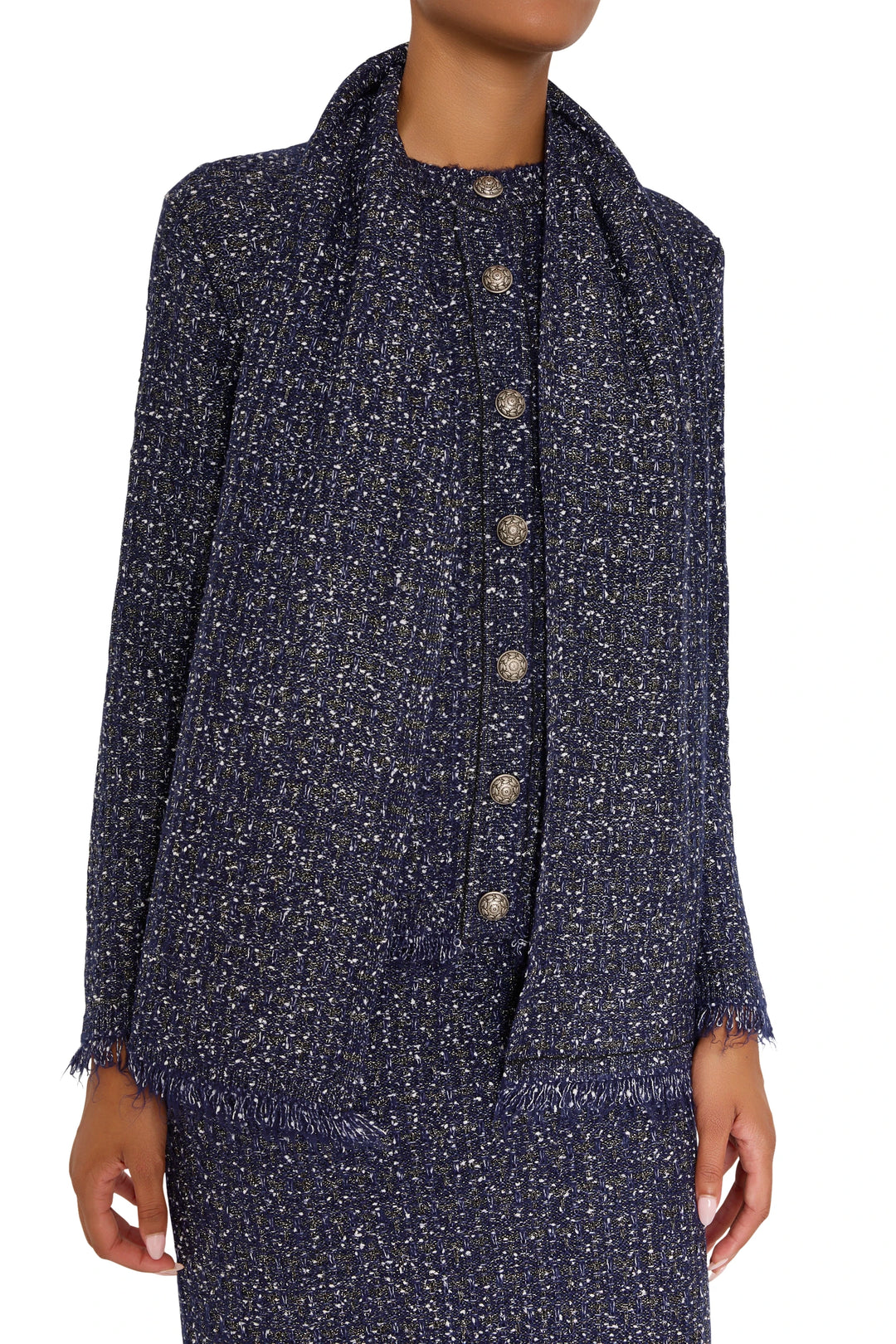 Collarless cardigan with straight silhouette, ribbed cuffs and hem, textured tweed, front buttons; front view on white.