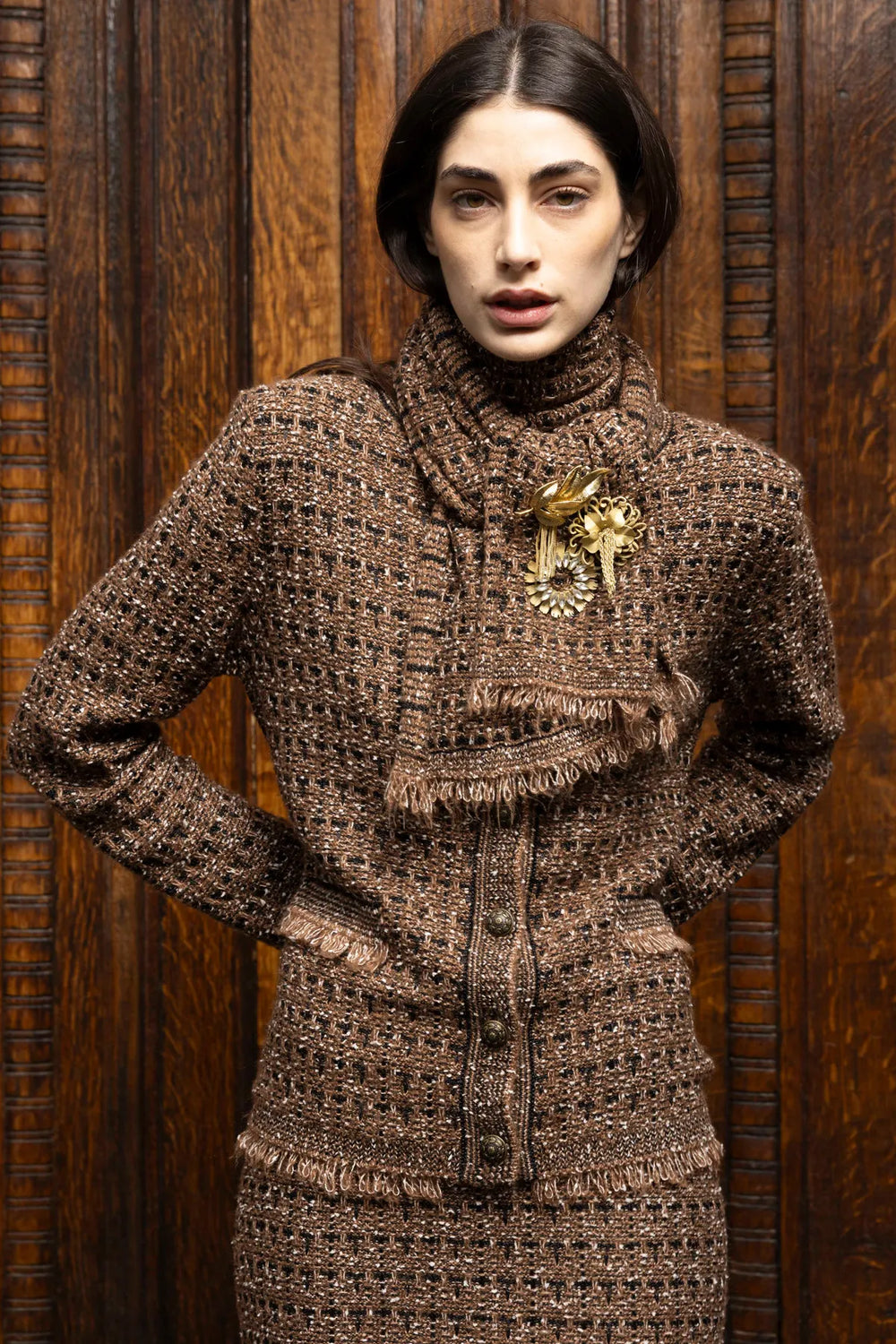 Relaxed-fit cardigan with textured tweed knit, long sleeves, front button closure; front view on model.