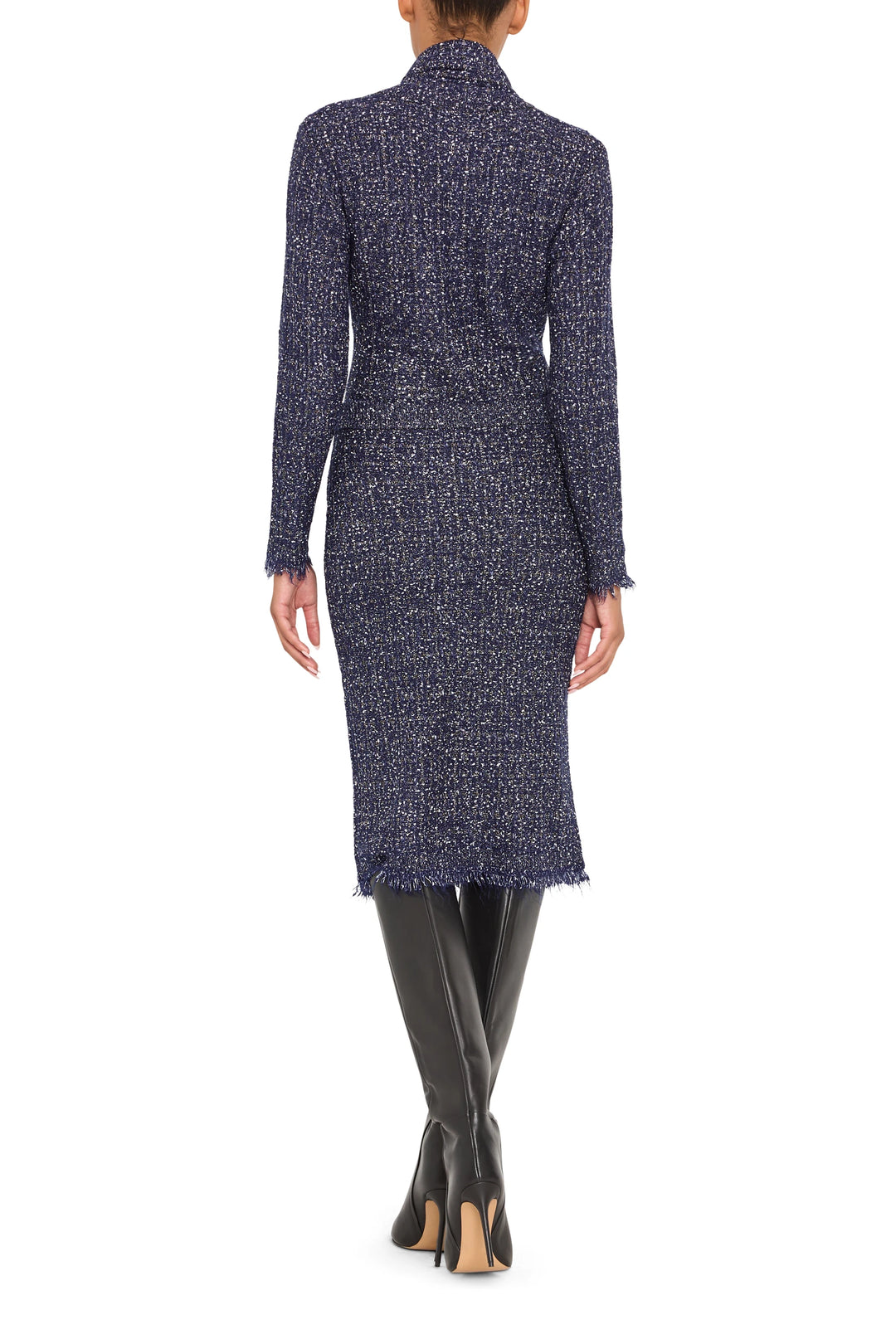 Straight, above-the-knee tweed skirt with subtle texture and fitted waistband; back view on model.
