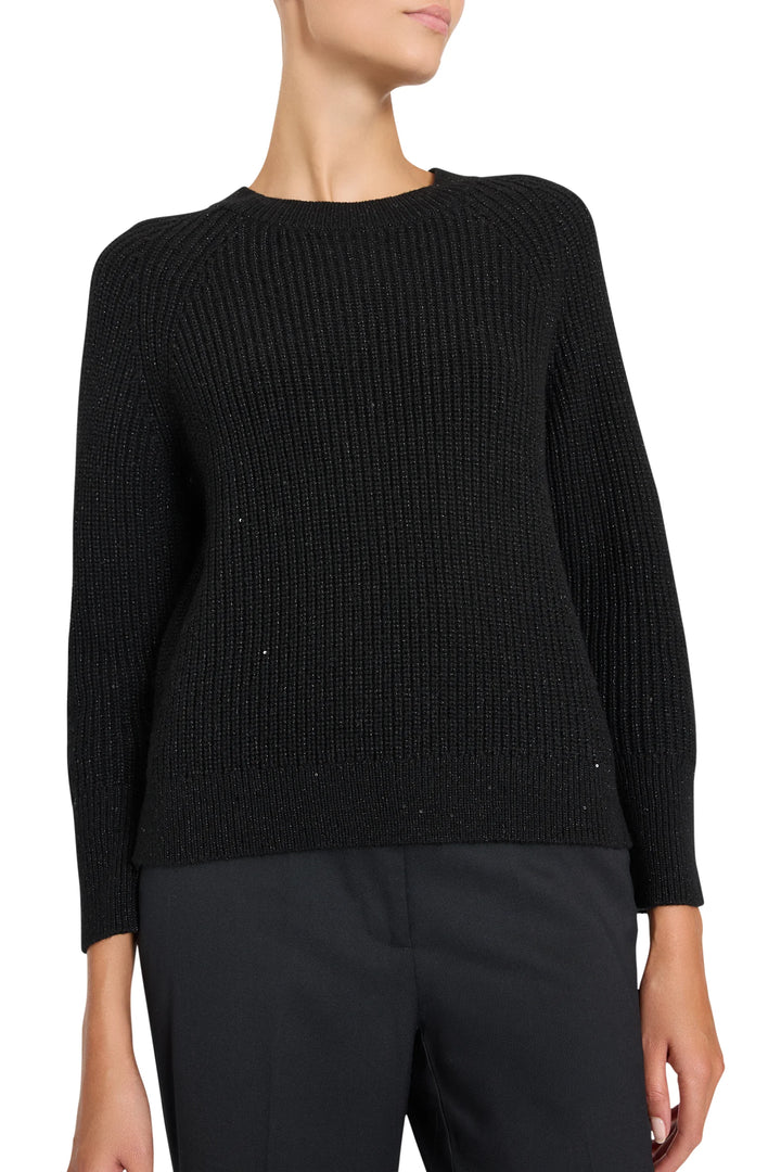 Kimberly Pull Over Sweater in black ribbed knit with long raglan sleeves, front view on model.