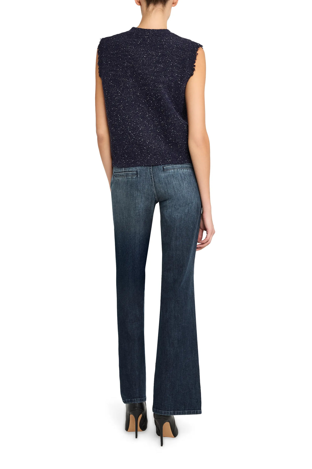 Sleeveless knit vest with ribbed trim and crewneck, relaxed fit; back view on model.