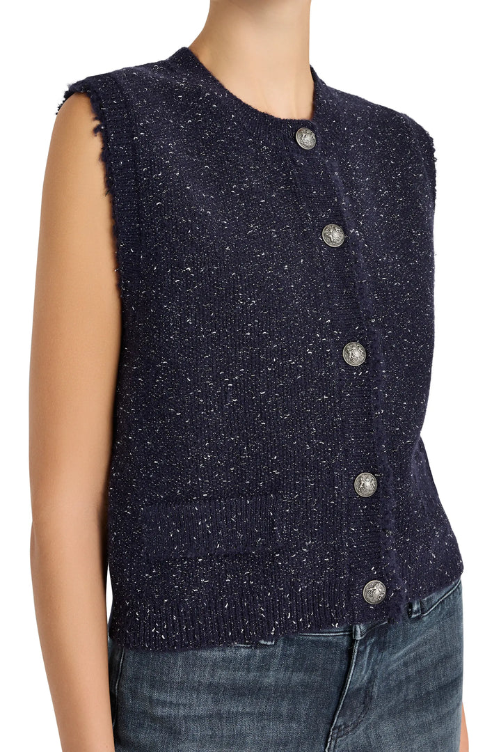 Sleeveless, relaxed-fit sweater vest with silver buttons, ribbed trim. Front view on model.