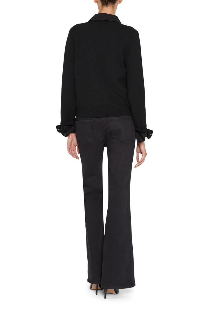 Slim, cropped sweater with denim paneling and ribbed hem; fitted sleeves; back view on model.