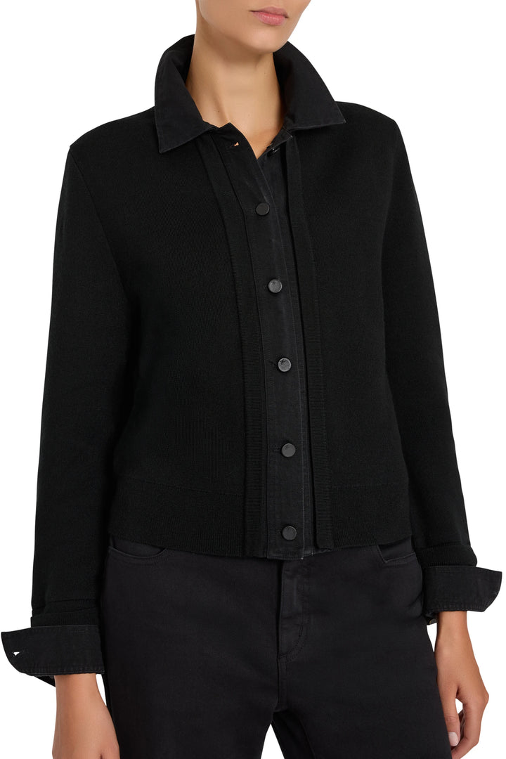 Relaxed fit sweater with denim paneling, ribbed cuffs and hem, pullover style; front view on model.
