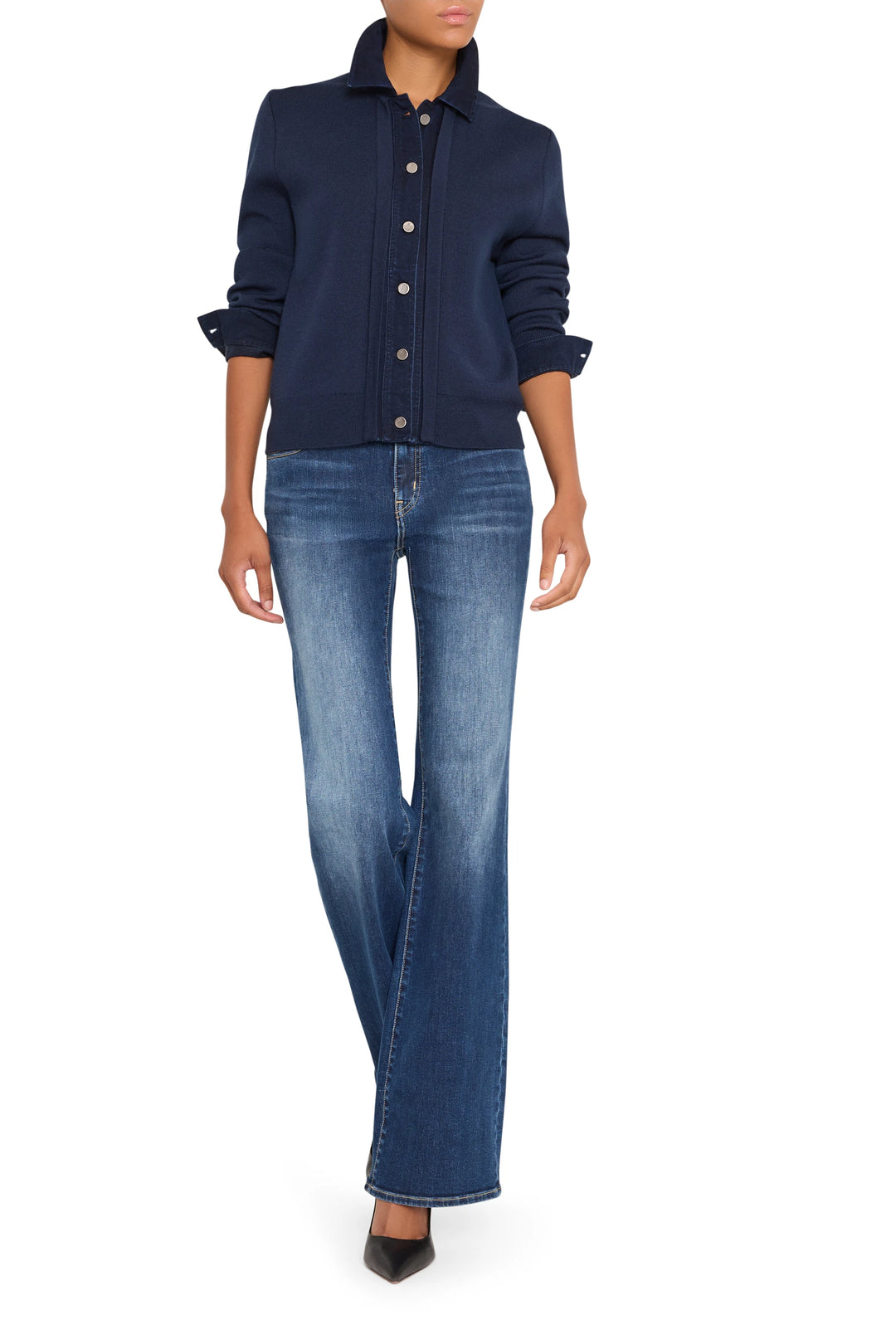 Relaxed-fit denim combo sweater with ribbed cuffs, hem, and crewneck. Front view on white.
