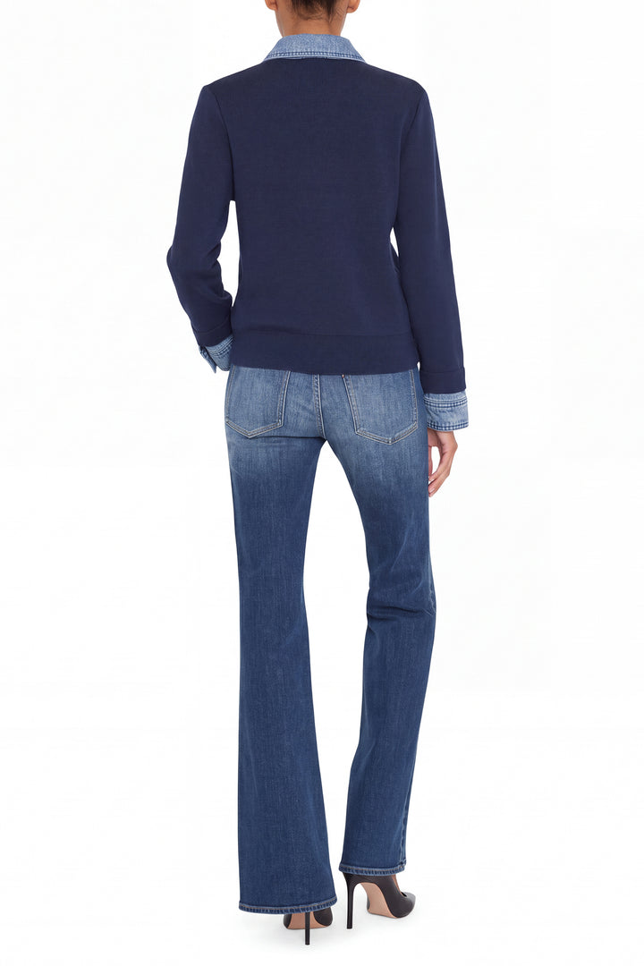 Relaxed-fit sweater with mixed denim knit panels and ribbed trims. Back view on white.