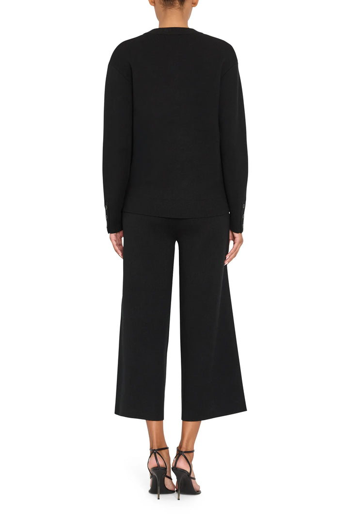 Wide-leg knit pant with elastic waistband and soft drape in saphire, back view on white background.