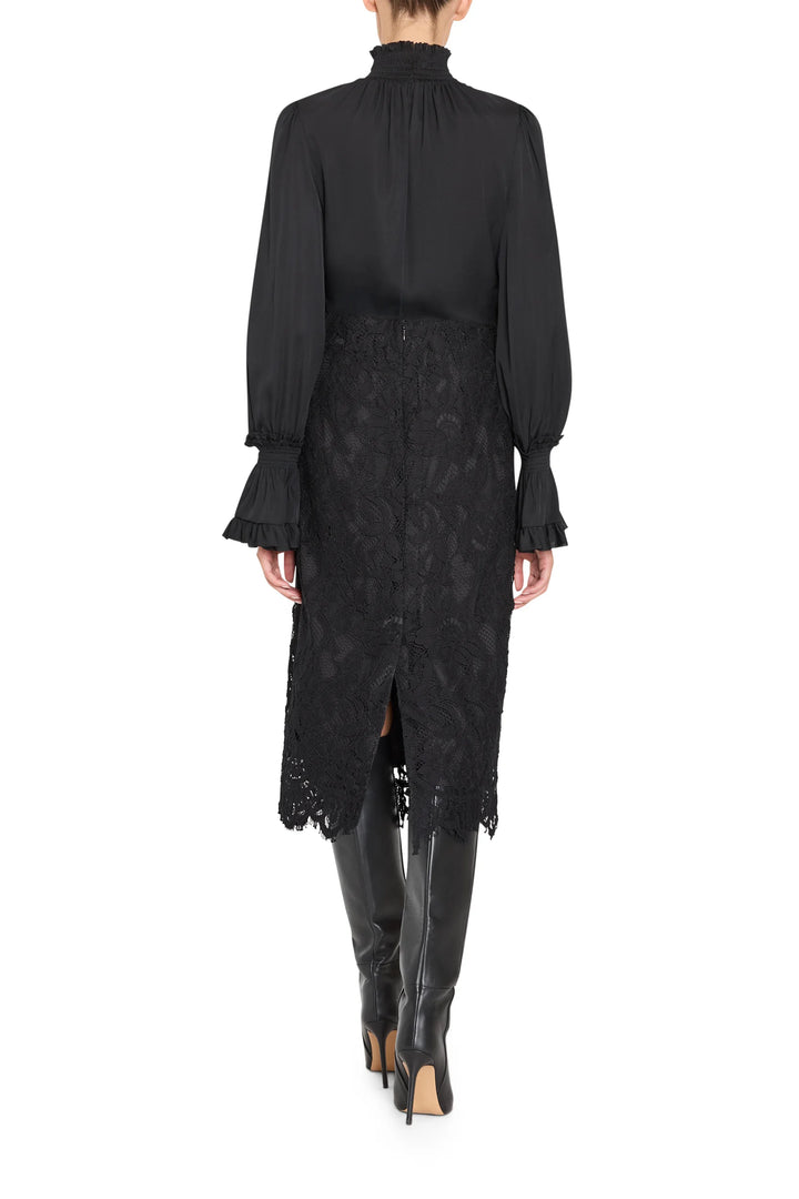 Simone Lace Skirt, a midi-length Italian corded lace pencil skirt with a back vent, back view.