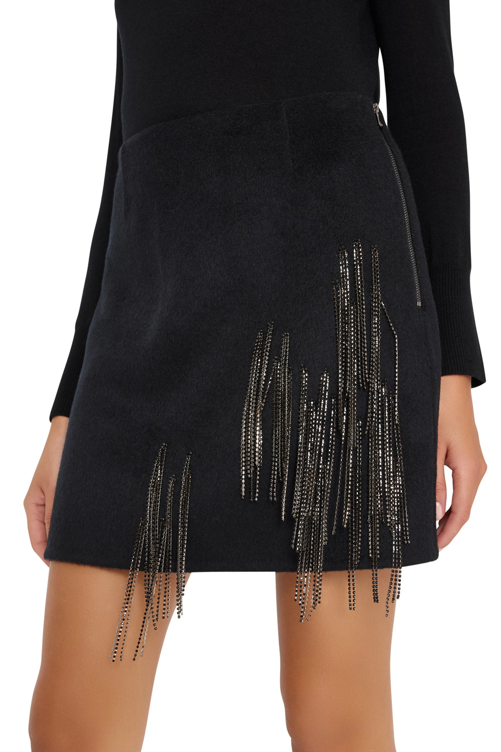 Mini skirt with embellished wool blend fabric, fitted silhouette, concealed zip. Front view on model.