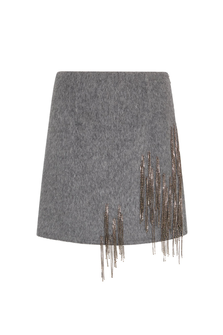 Mini skirt in wool blend with crystal embellishments, asymmetric silver chain fringe. Front view on white.