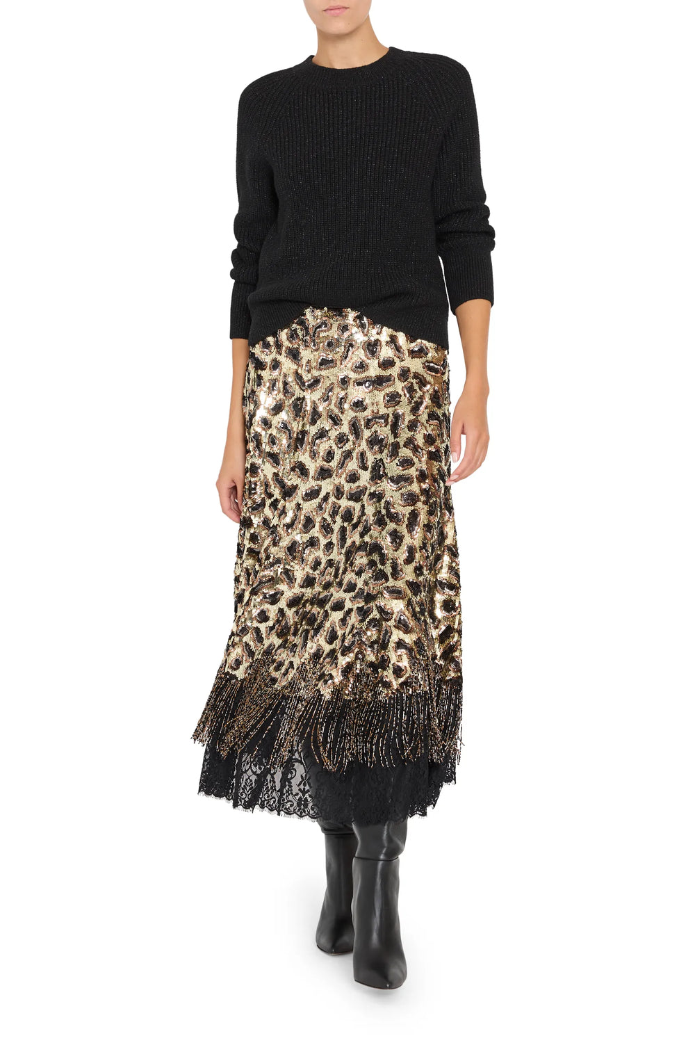 Maeve Sequin Skirt features a straight silhouette, beaded fringe detail, and sequin-embellished fabric; front view on model.