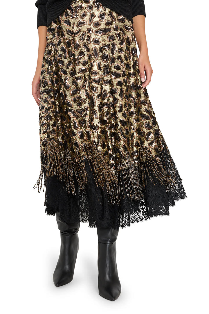 Maeve Sequin Skirt with lace border and beaded fringe, fitted silhouette, sequin detail; front view on model.