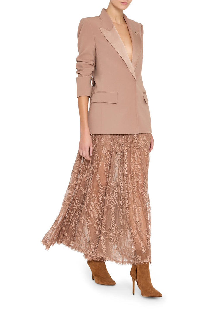 Long lace midi skirt with sheer floral panels, fitted waist, scallop hem; front view on white.
