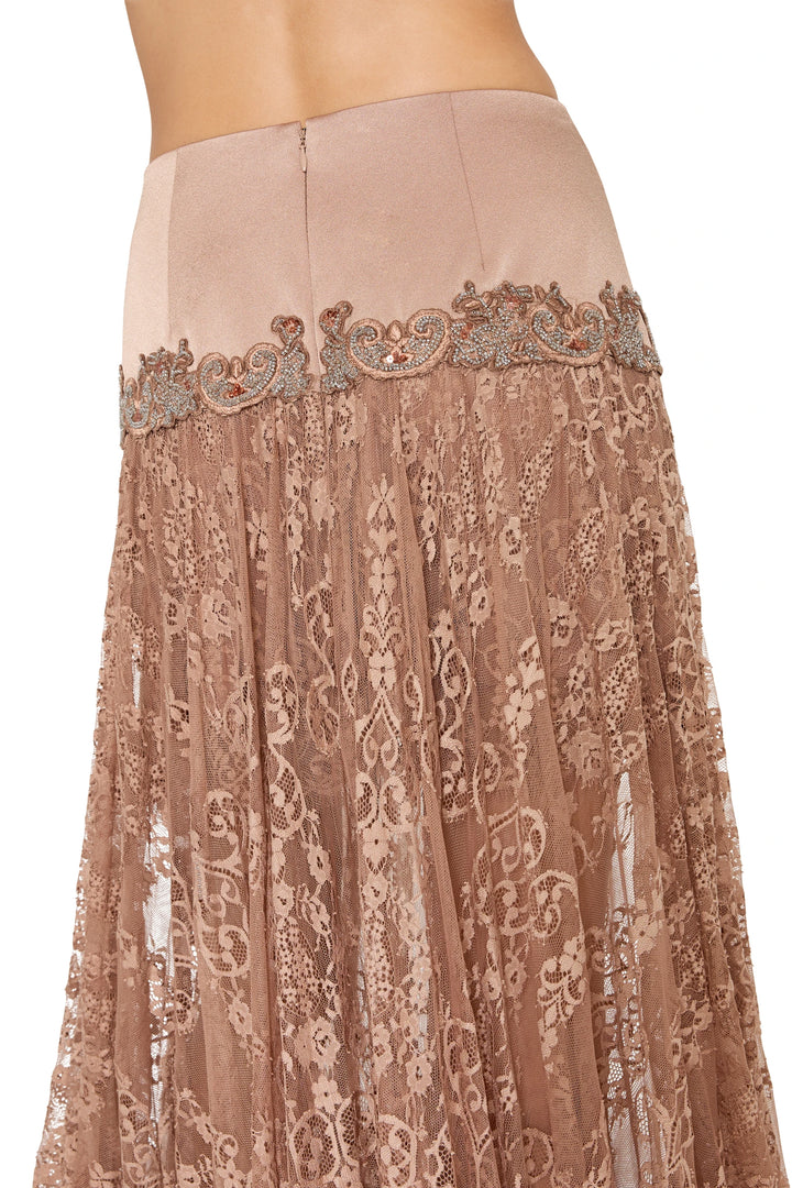 Ornate lace embroidery and satin waistband detail on Yvonne Long Lace Skirt; embroidery close-up, detail view.