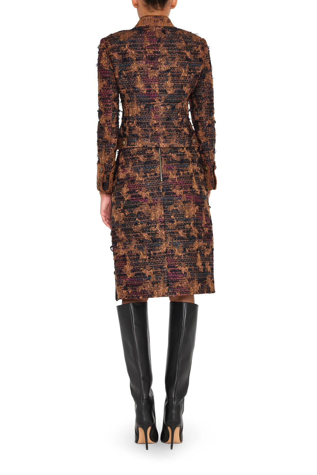Tweed skirt with tailored midi silhouette and paneled construction, back view on model.