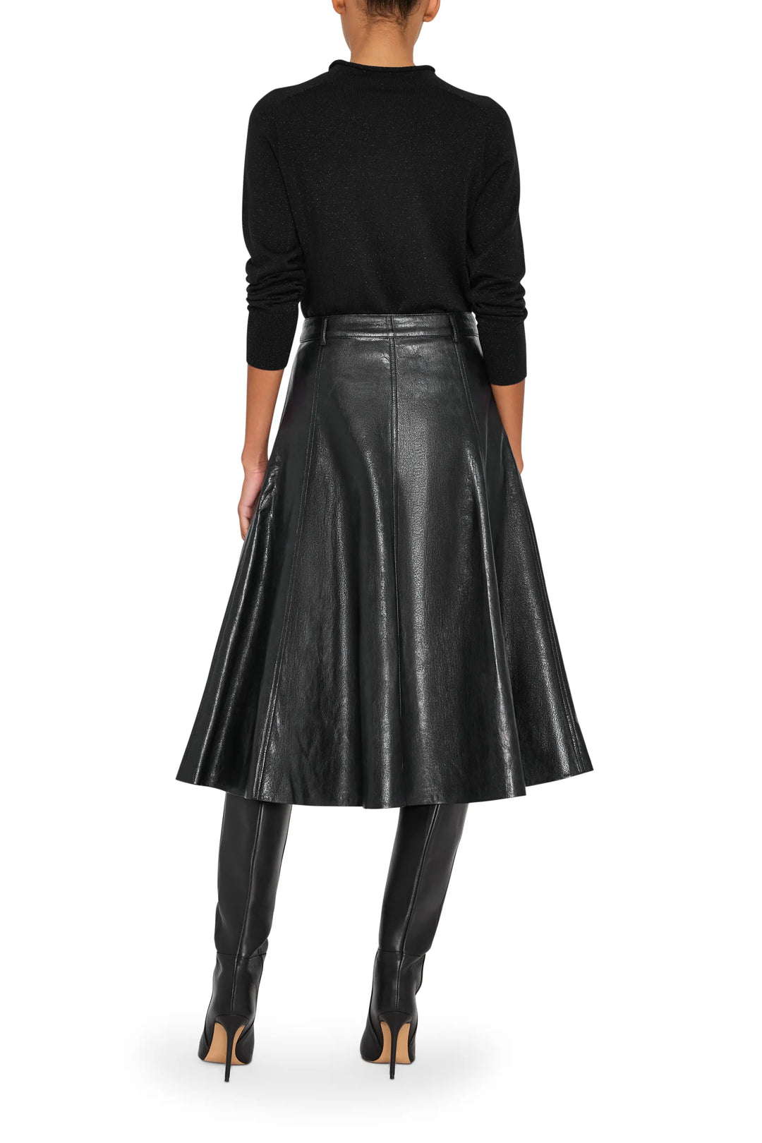 Vegan leather skirt with straight silhouette and clean waistband, knee-length hem; back view on model.